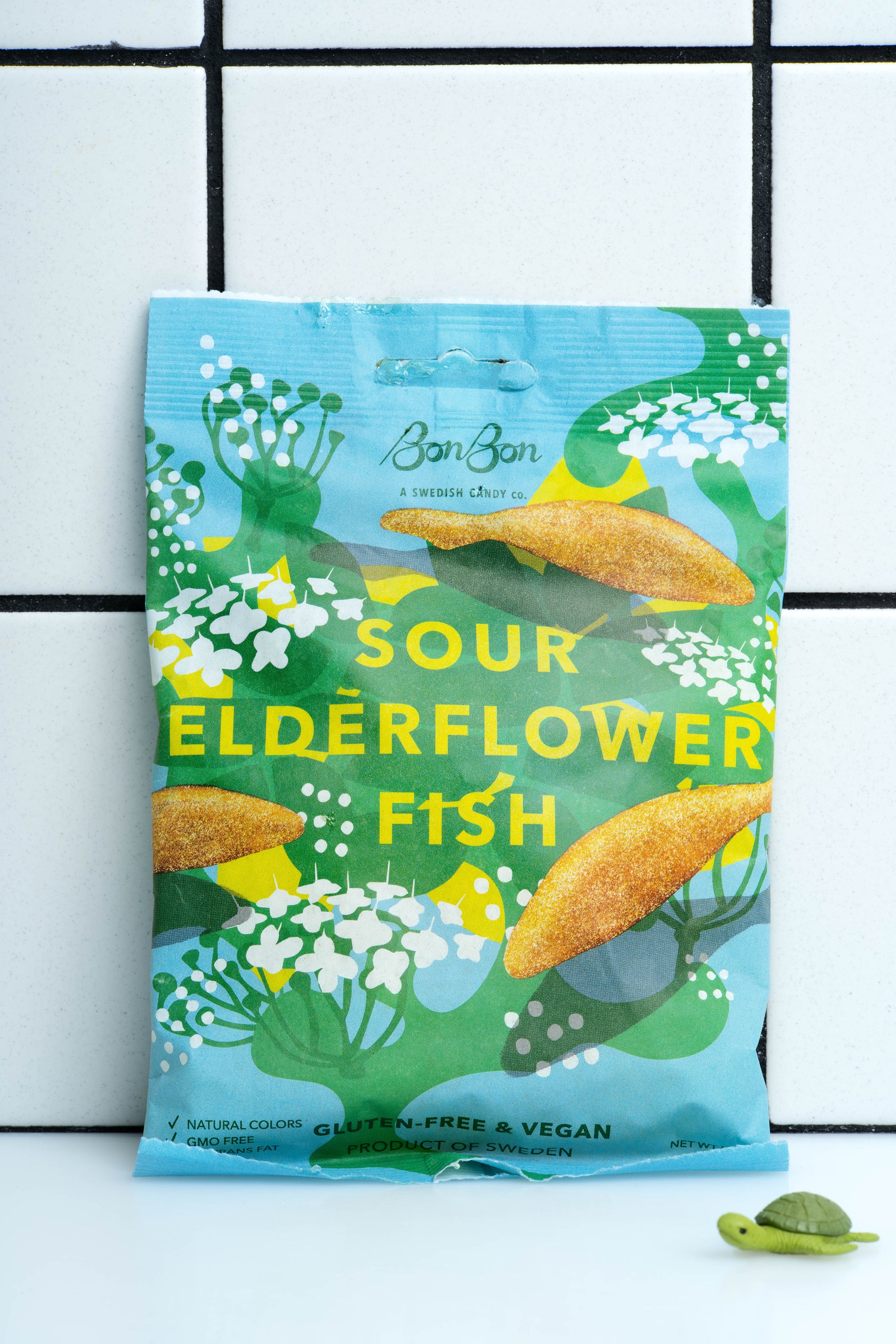 Sour Elderflower Fish by Bon Bon New York packaged in a blue bag with yellow text.