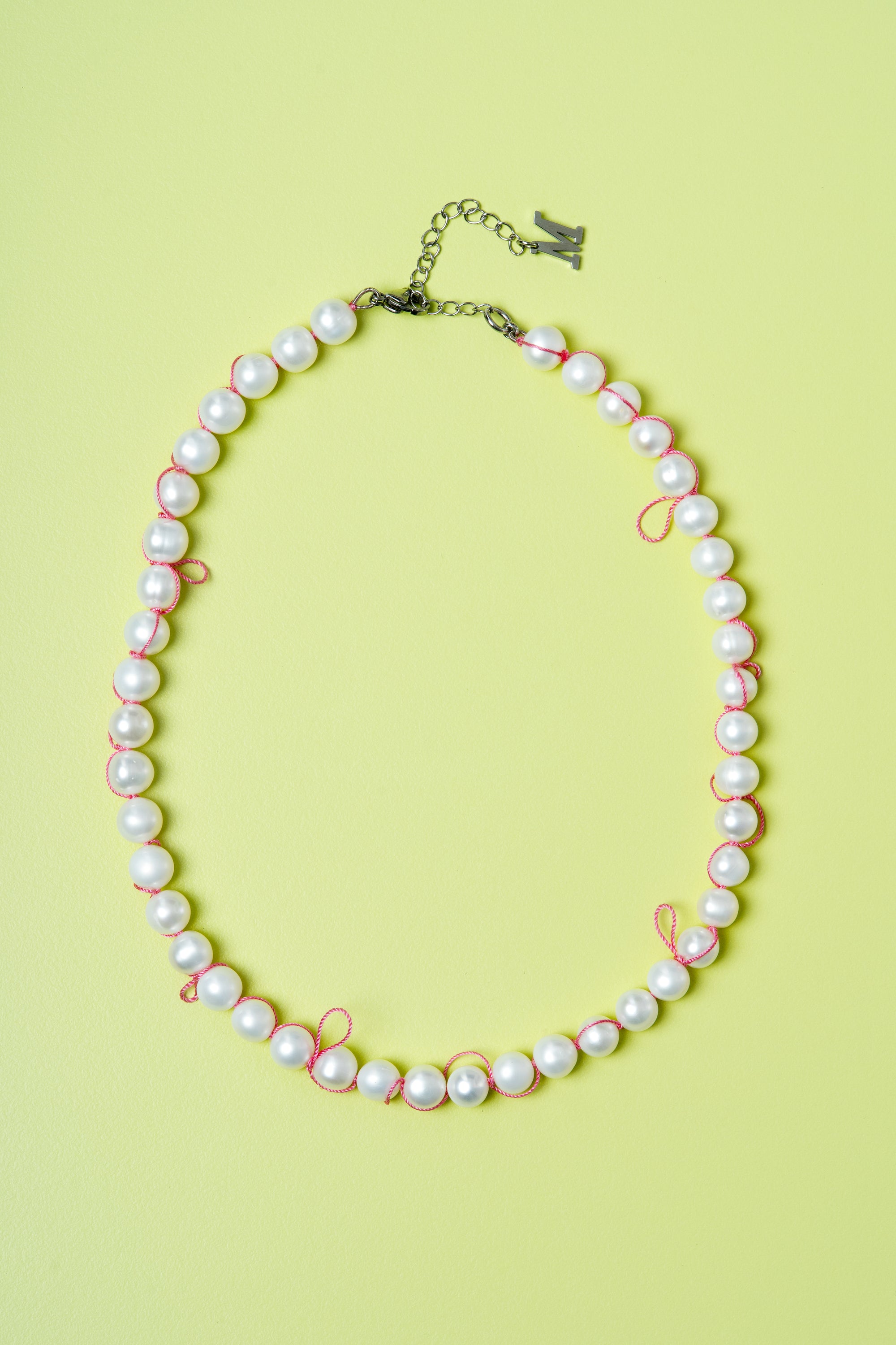 
    
        Knotted Pearl Necklace
    
  